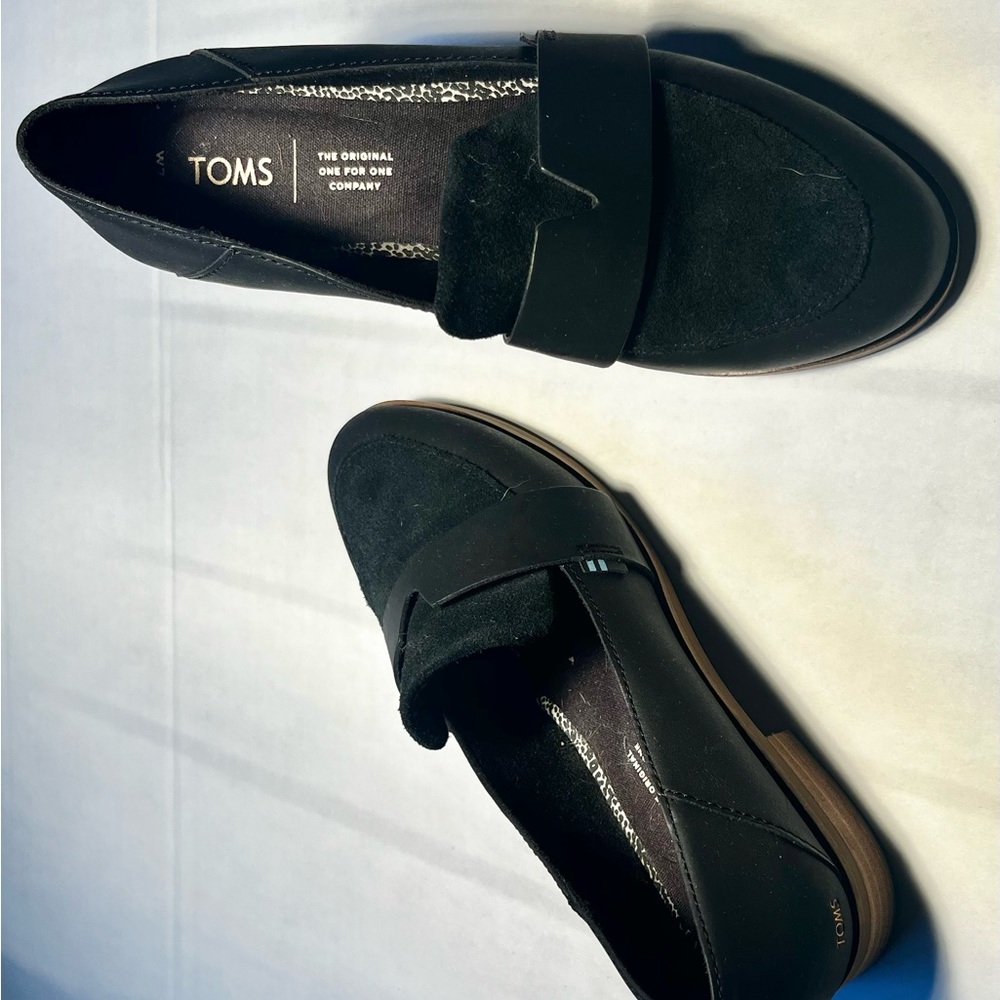 Black Toms women’s shoes.
